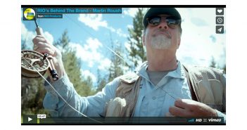 A man is holding a fly rod in a video.