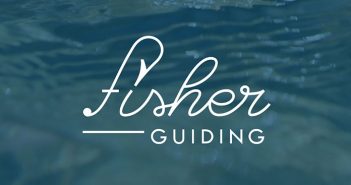 Fisher guiding logo in the water.