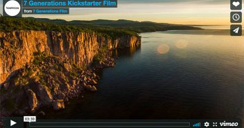 A screen shot of a cliff with a view of the ocean.