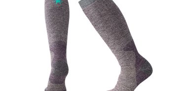 A pair of women's ski socks in purple and grey.