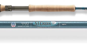 A fly rod with a blue handle and a wooden handle.