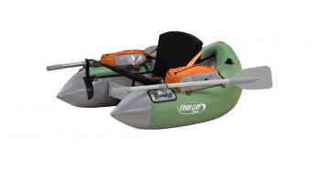 A green and orange raft with paddles on it.