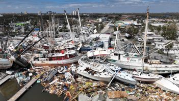 A boat docked in a harbor after hurricane katrina.