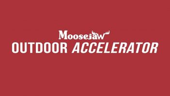 A red background with the words moosecaw outdoor accelerator.