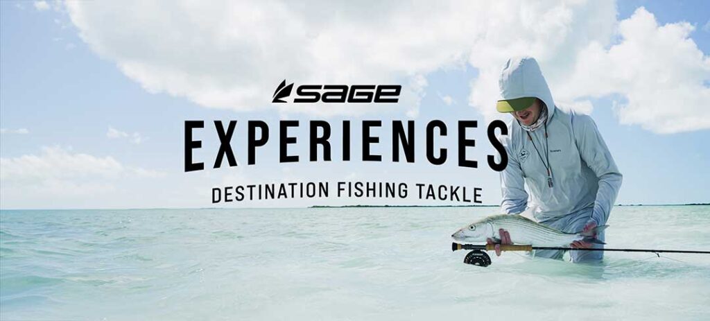 Person wearing a hoodie and sunglasses holding a fish and fishing rod in shallow clear water. Text reads "Sage Experiences Destination Fishing Tackle.