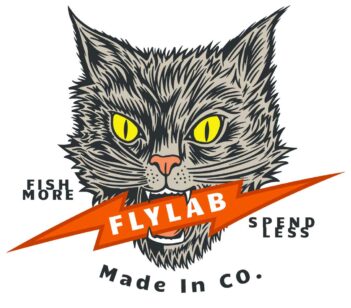 Graphic of a cat's head with yellow eyes and an open mouth biting an orange banner that reads “Flylab." The text "Fish More" and "Spend Less" are on either side, and "Made in CO." is below.