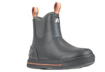 A single dark rubber boot with orange pull tabs and a logo on the side is shown against a white background.