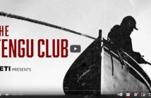 A silhouetted person on a boat featured in the video thumbnail titled "The Tengu Club" presented by YETI.