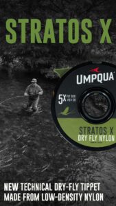Angler fly fishing in a river with an enlarged image of Stratos X dry fly nylon spool in the foreground. Text highlights it's made from low-density nylon and fits fly sizes #14-20.